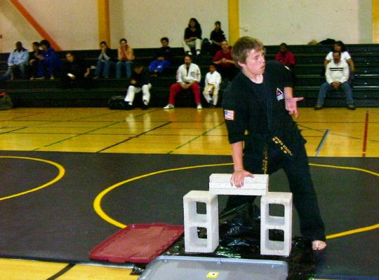 Inst. Wagner prepares his break of concrete blocks